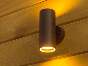 Outdoor,Exterior,Small,Cylinder,Lamp,On,Wooden,Wall.,External,Illumination